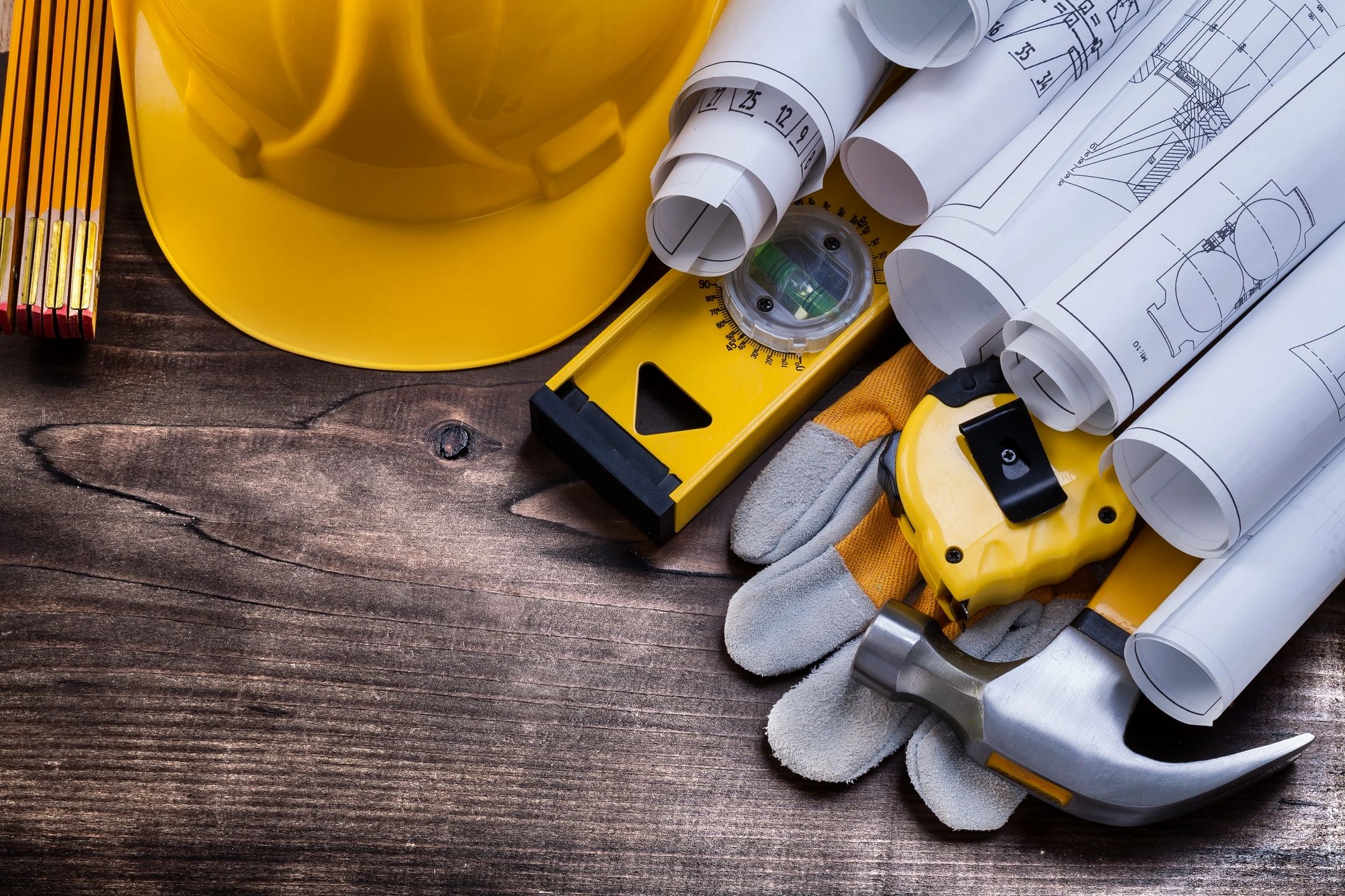Construction tools and blueprints