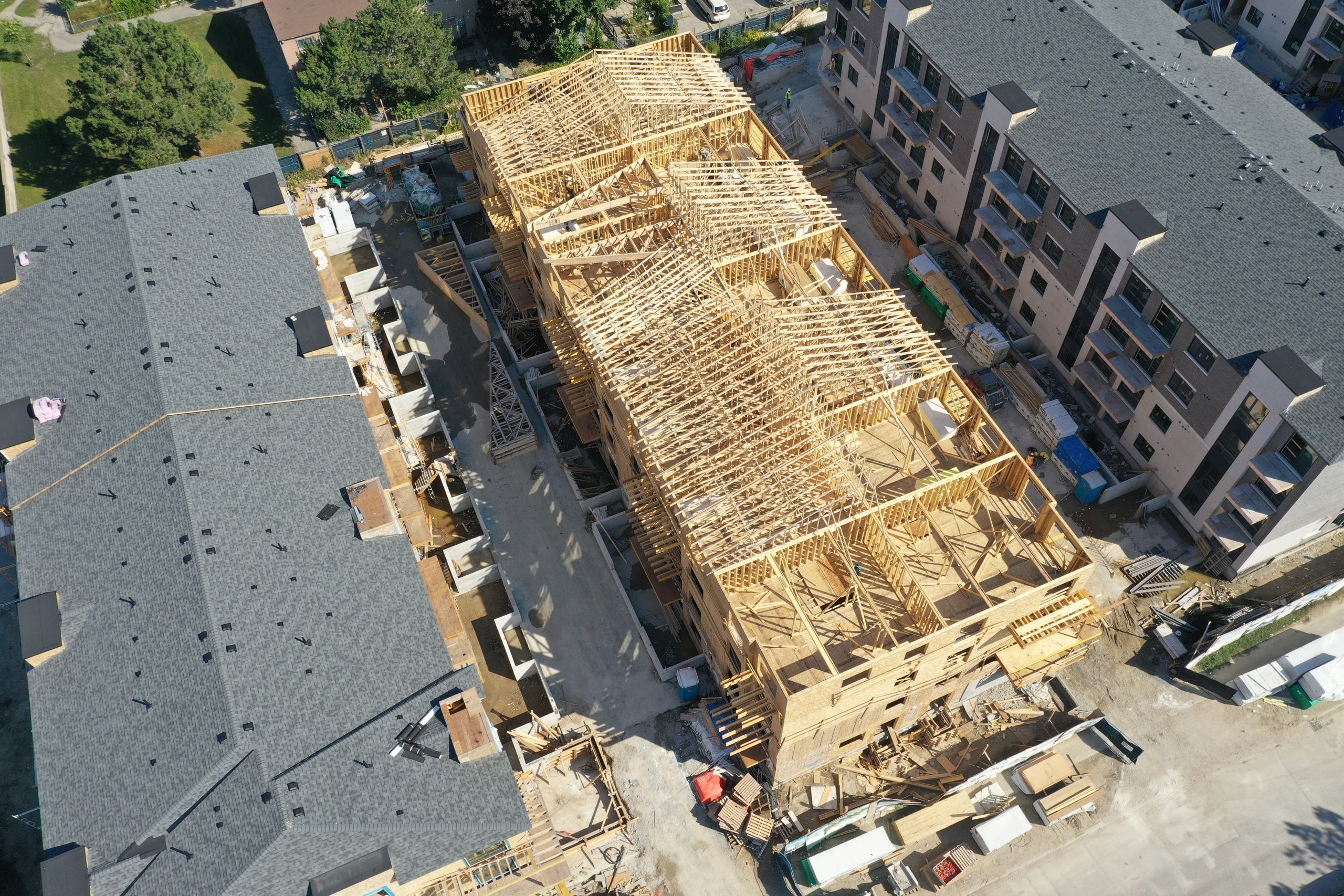 Multi-story brick residential building under construction