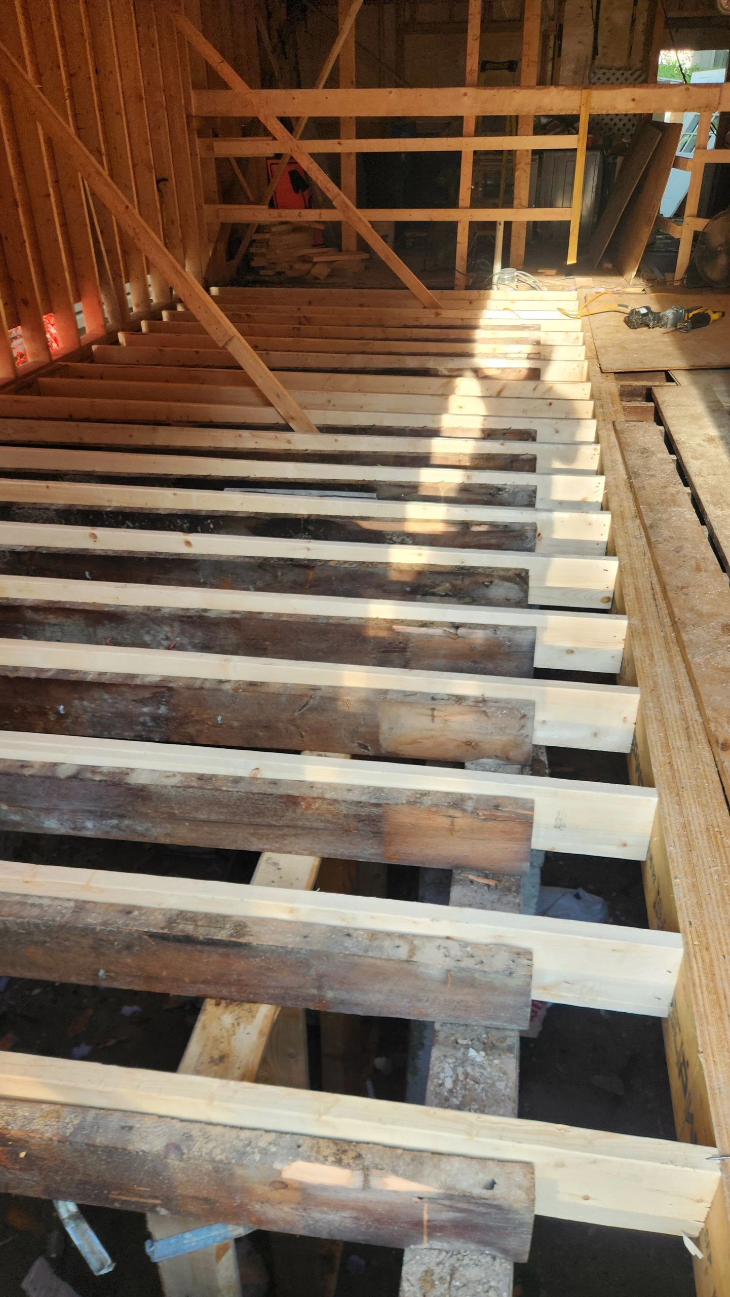 Interior wooden floor joists framing construction